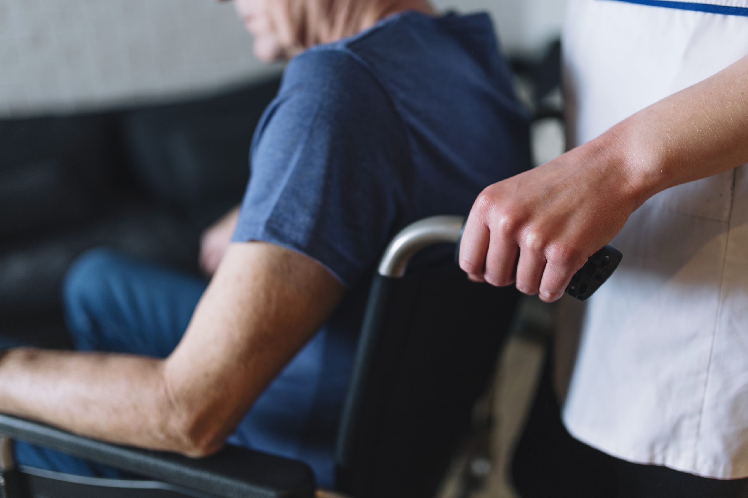 man-wheelchair-old-age-home